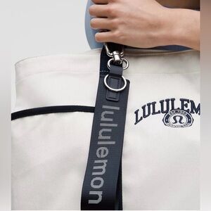 lululemon athletica keychain true navy and white